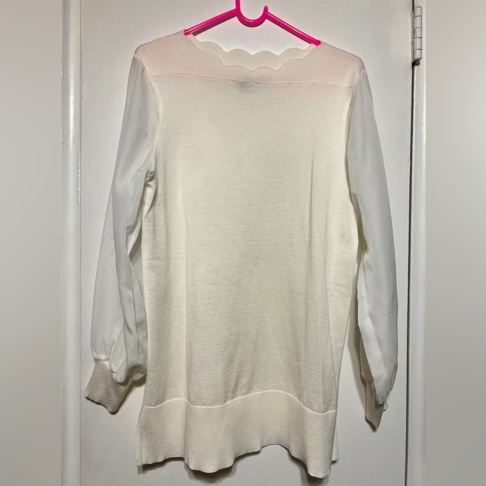 White sweater, sheer sleeves